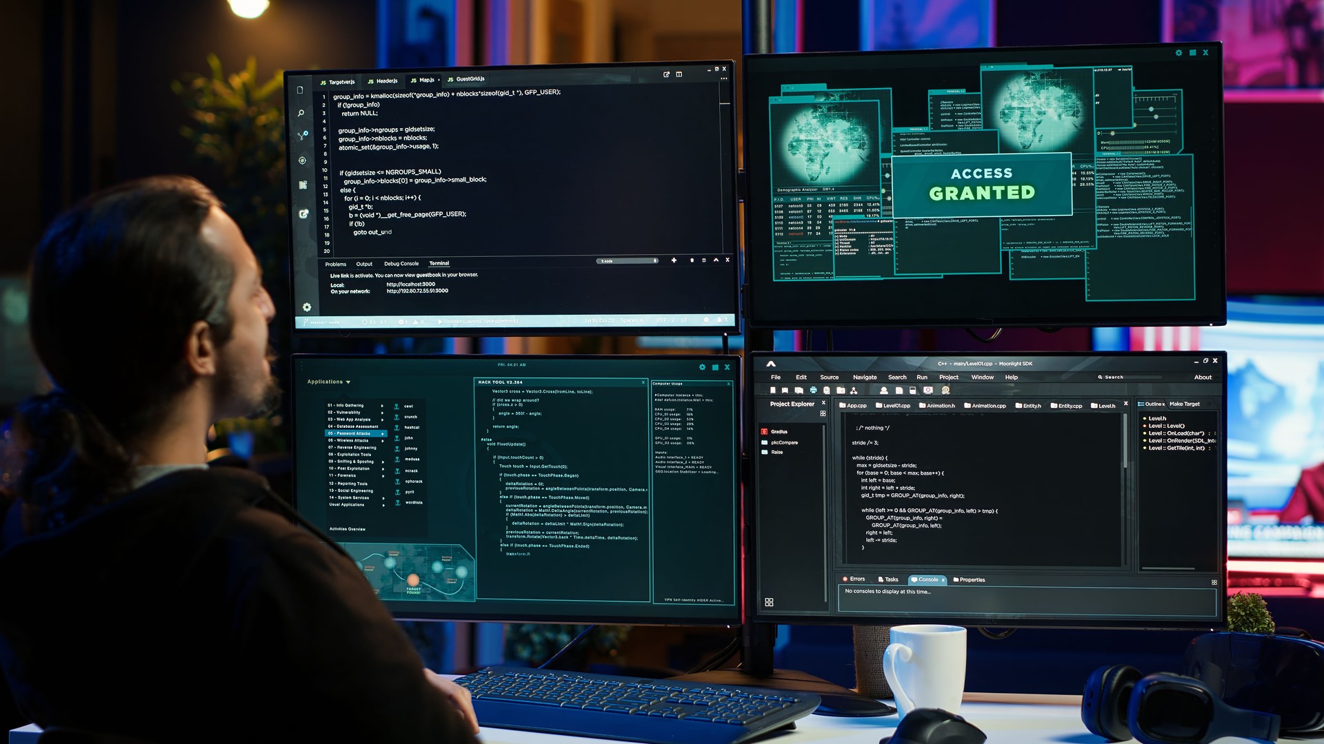 Happy hacker in secret hideout celebrating after hacking victims
